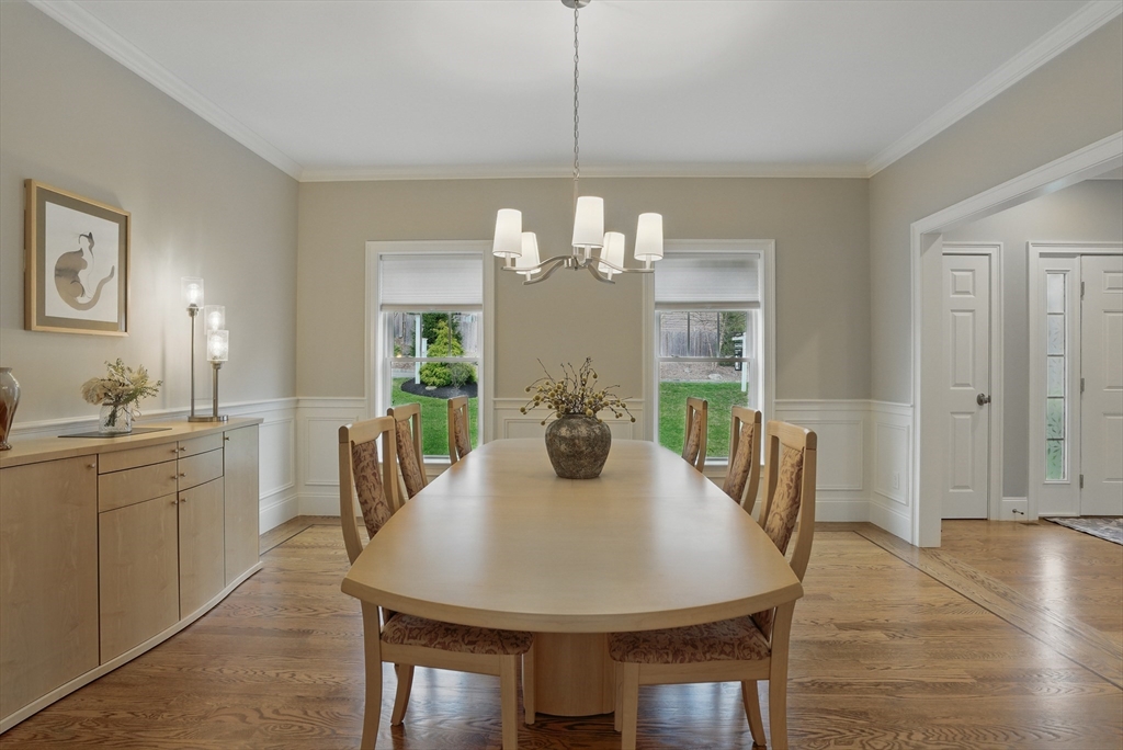 3 Willow Lane Bedford, MA 01730 - Photo 13 of 36 a view of a dining room with furniture window and wooden floor