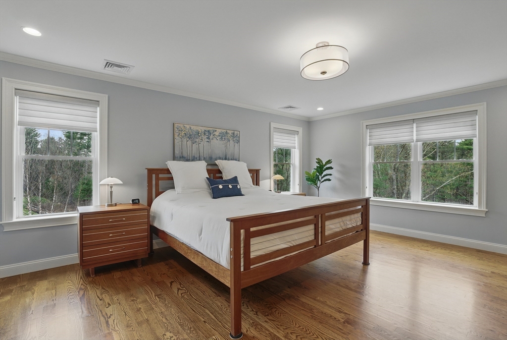 3 Willow Lane Bedford, MA 01730 - Photo 19 of 36 a bed room with a bed and a window