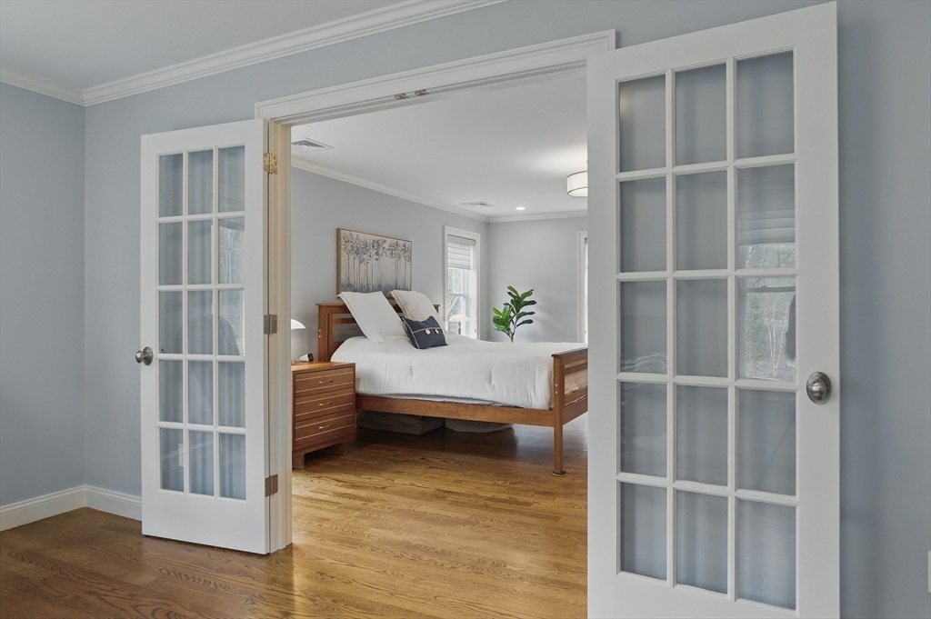 3 Willow Lane Bedford, MA 01730 - Photo 20 of 36 a room with a furniture and a window