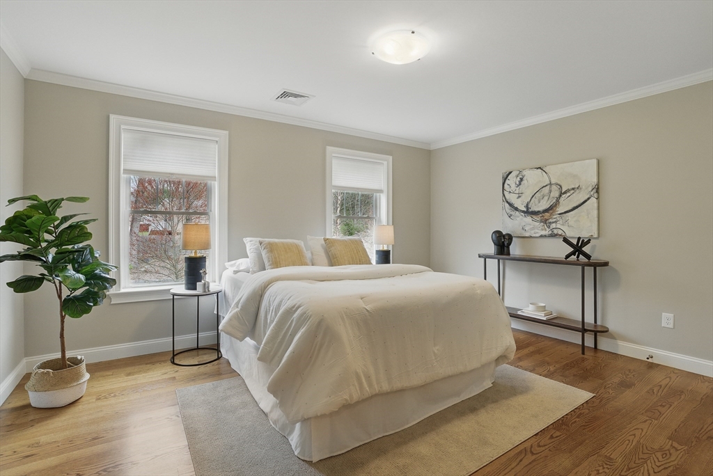 3 Willow Lane Bedford, MA 01730 - Photo 23 of 36 a bedroom with a bed and window