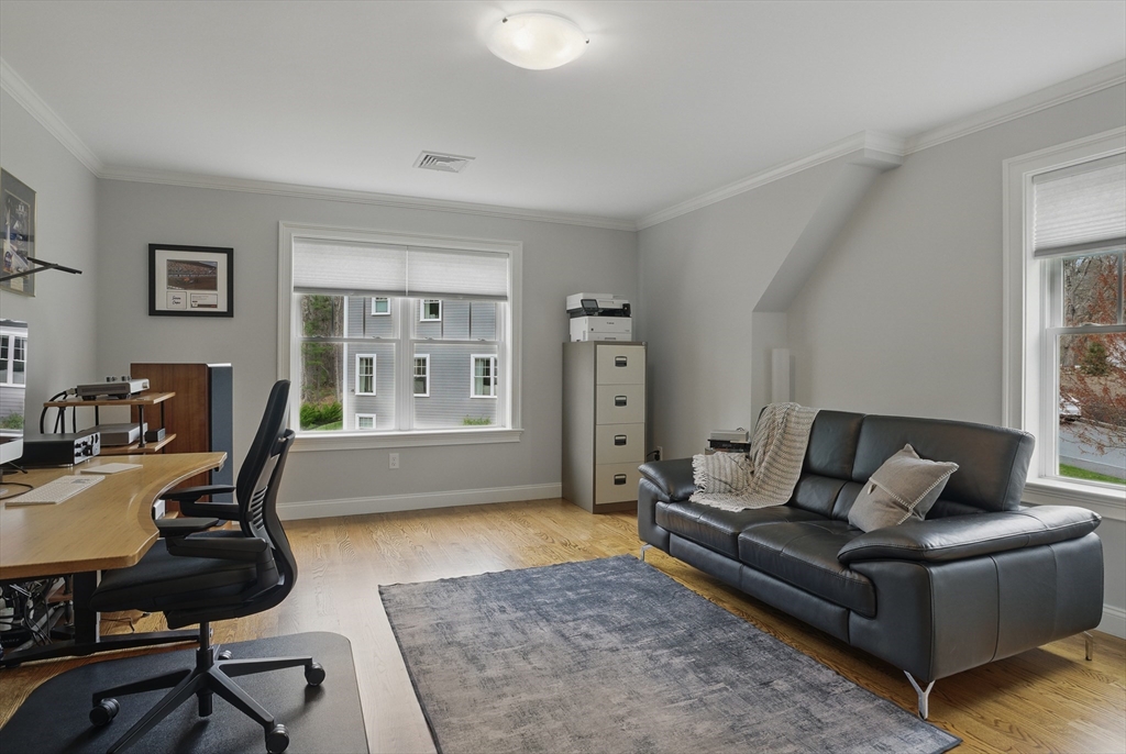 3 Willow Lane Bedford, MA 01730 - Photo 25 of 36 a living room with furniture and a window