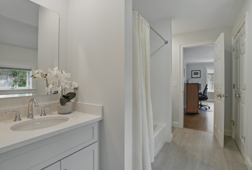 3 Willow Lane Bedford, MA 01730 - Photo 26 of 36 a en suite bathroom with a sink and a mirror
