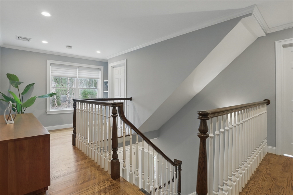 3 Willow Lane Bedford, MA 01730 - Photo 28 of 36 a view of entryway with wooden floor and windows