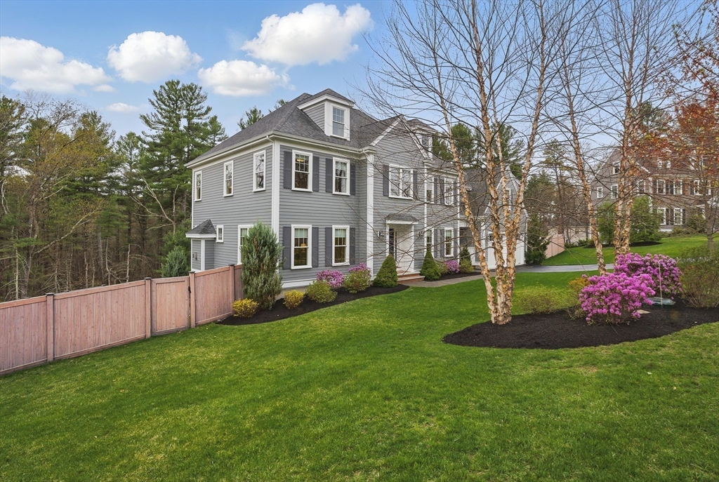 3 Willow Lane Bedford, MA 01730 - Photo 36 of 36 a front view of a house with garden