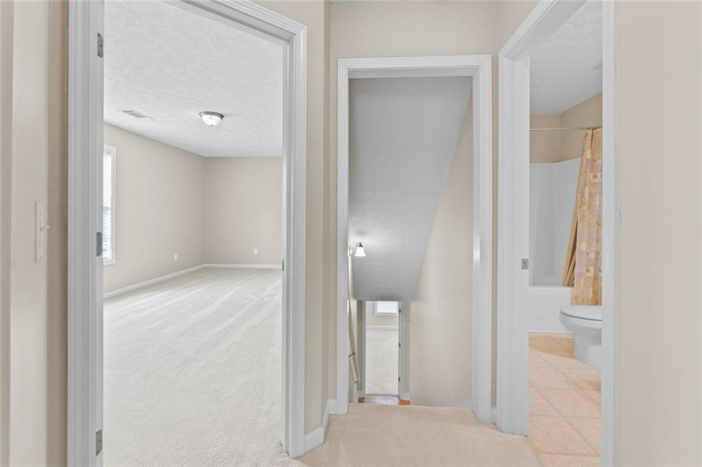 241 Red Bud Road Jefferson, GA 30549 - Photo 33 of 43 a view of a bathroom from a hallway