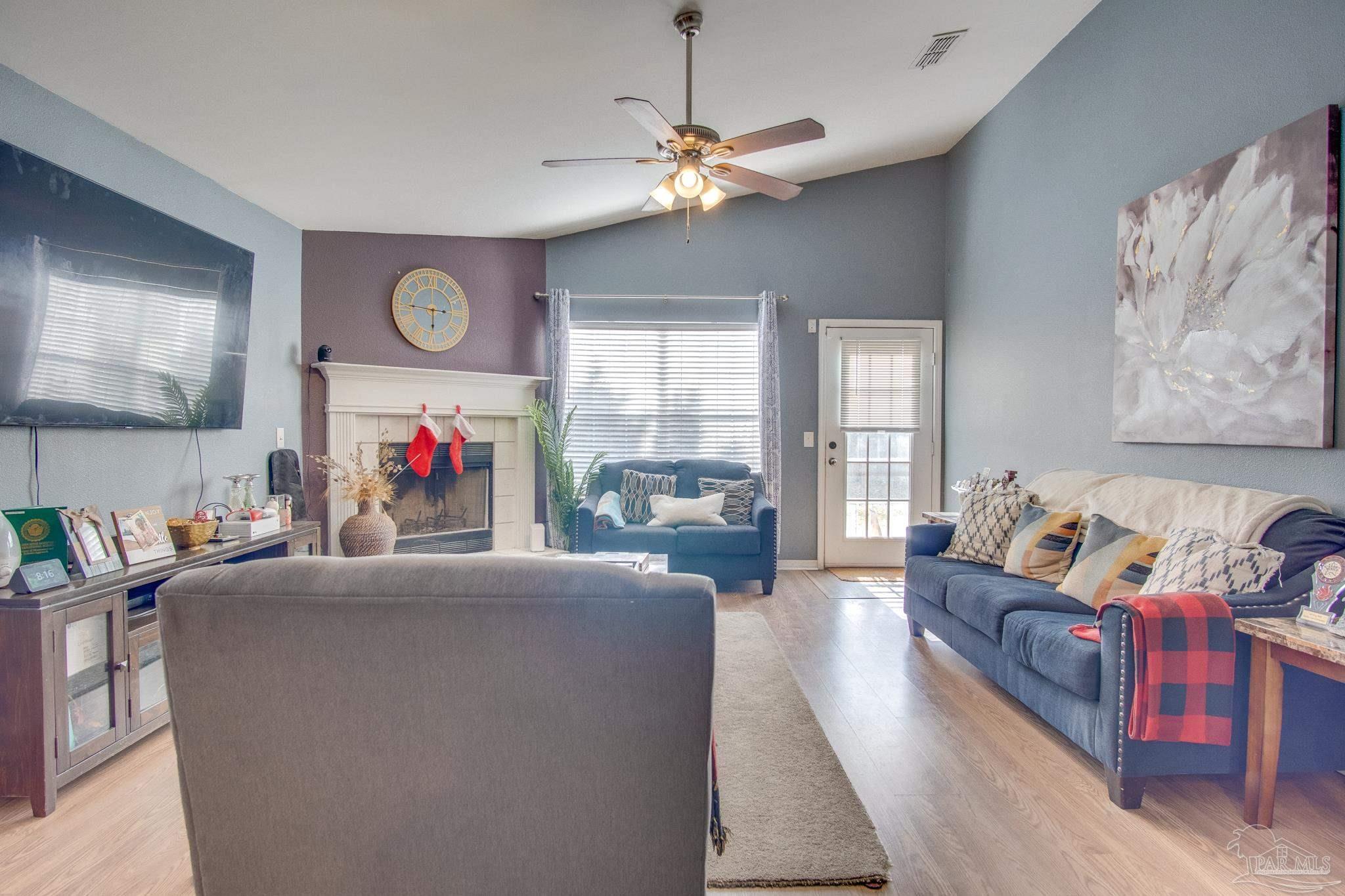 2005 Tujaques Place Pensacola, FL 32505 - Photo 4 of 30 a living room with furniture and a large window