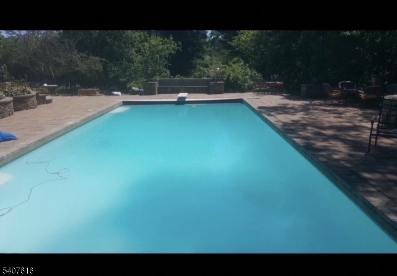 871 Colonia Road Elizabeth, NJ 07208 - Photo 12 of 12 a view of a swimming pool with a yard