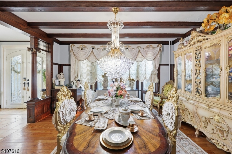 871 Colonia Road Elizabeth, NJ 07208 - Photo 5 of 12 a very nice looking room with lots of furniture and windows