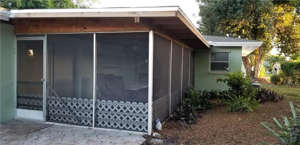 4201 23rd Place Southwest Naples, FL 34116 - Photo 11 of 19 a view of a wooden door