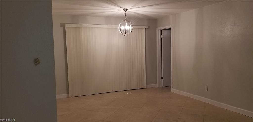 4201 23rd Place Southwest Naples, FL 34116 - Photo 16 of 19 a view of empty room with window