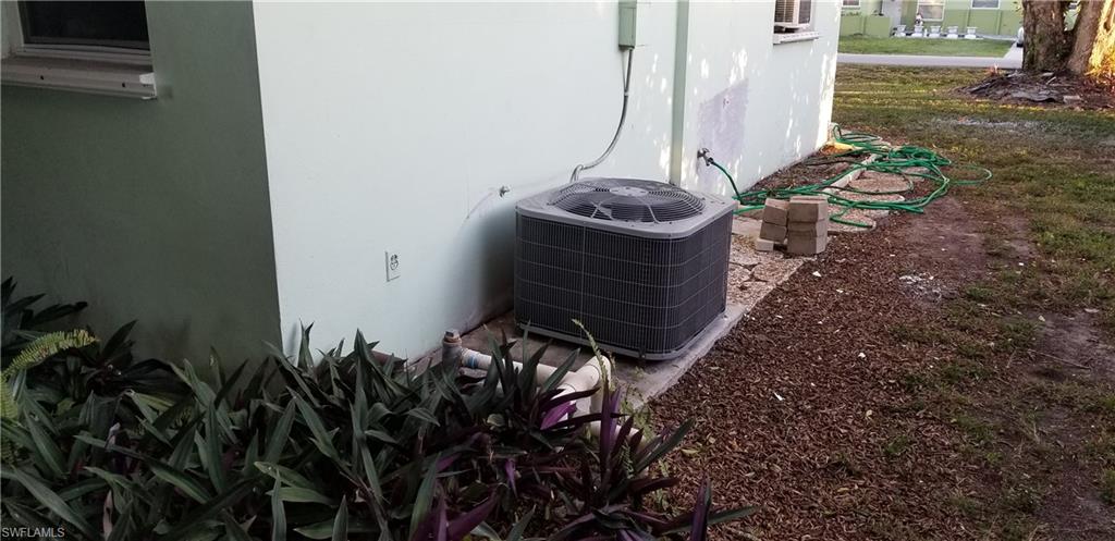 4201 23rd Place Southwest Naples, FL 34116 - Photo 6 of 19 a picture of water heater