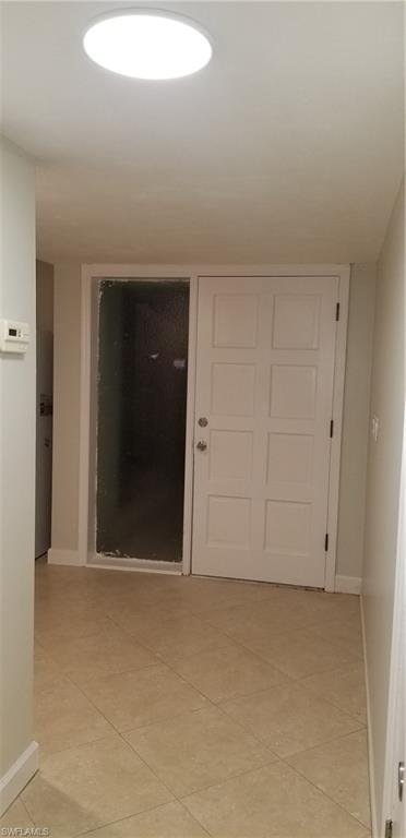 4201 23rd Place Southwest Naples, FL 34116 - Photo 8 of 19 an empty room with window