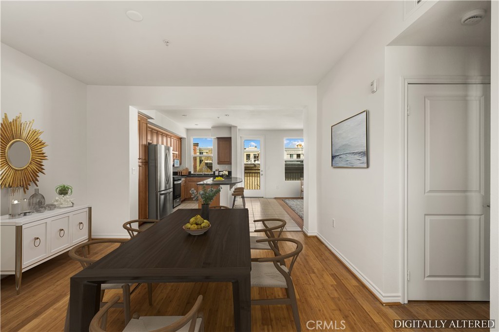 85 East Commonwealth Avenue, Unit 3D Alhambra, CA 91801 - Photo 12 of 30 a view of a dining room with furniture and wooden floor