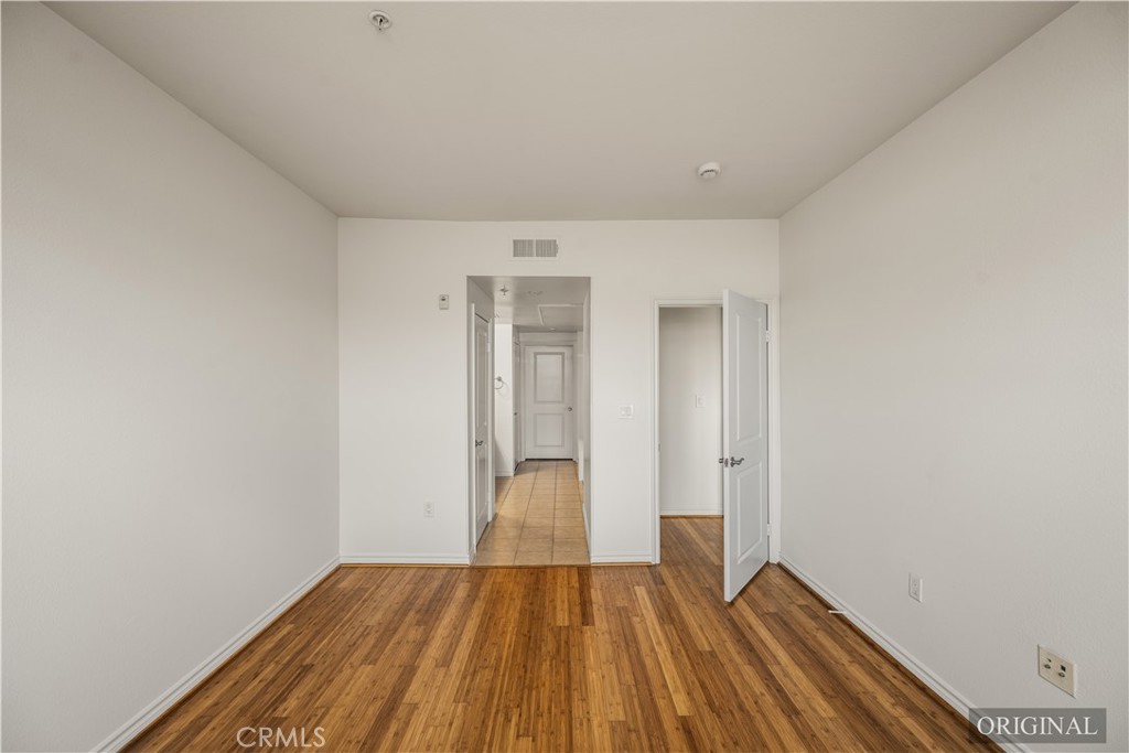 85 East Commonwealth Avenue, Unit 3D Alhambra, CA 91801 - Photo 15 of 30 a view of a room with wooden floor