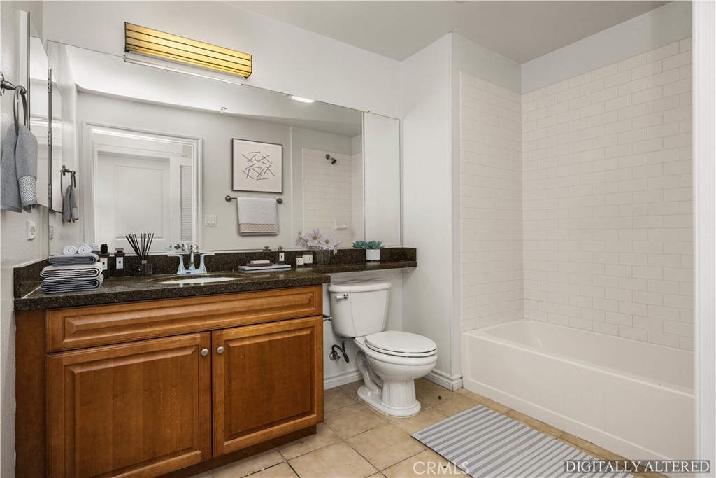 85 East Commonwealth Avenue, Unit 3D Alhambra, CA 91801 - Photo 23 of 30 a bathroom with a sink a toilet and bathtub