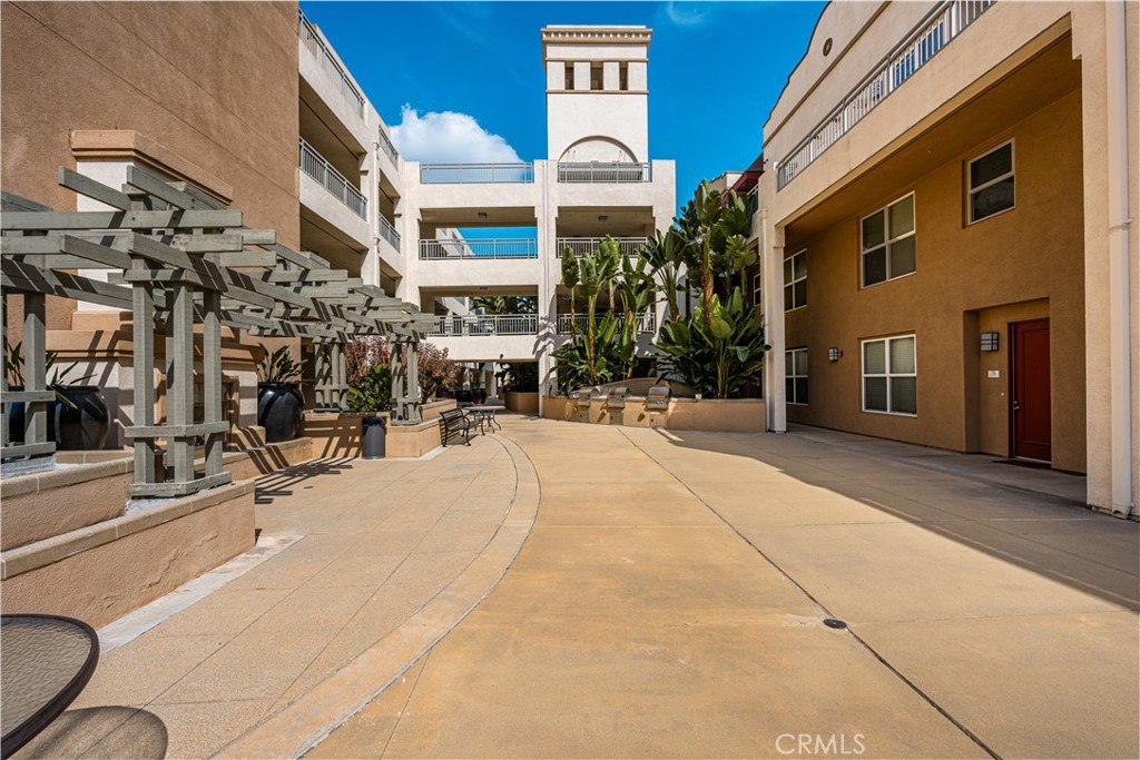 85 East Commonwealth Avenue, Unit 3D Alhambra, CA 91801 - Photo 28 of 30 a view of a building with a street