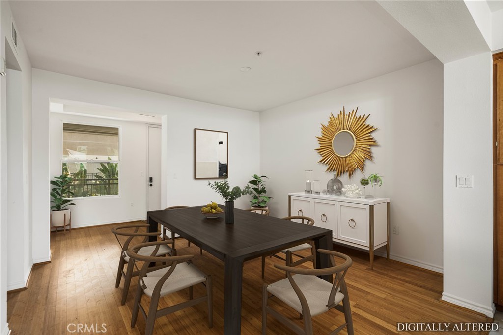 85 East Commonwealth Avenue, Unit 3D Alhambra, CA 91801 - Photo 10 of 30 a view of a dining room with furniture and wooden floor