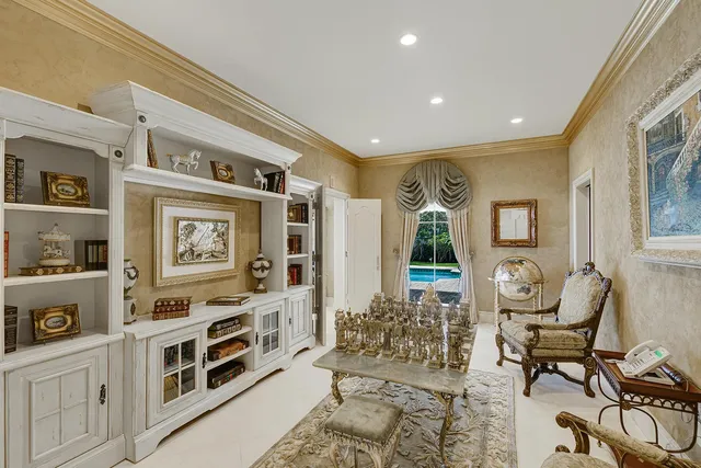 a bathroom with a tub shower and mirror
