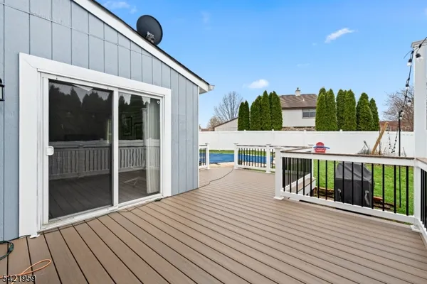 a view of swimming pool with outdoor seating