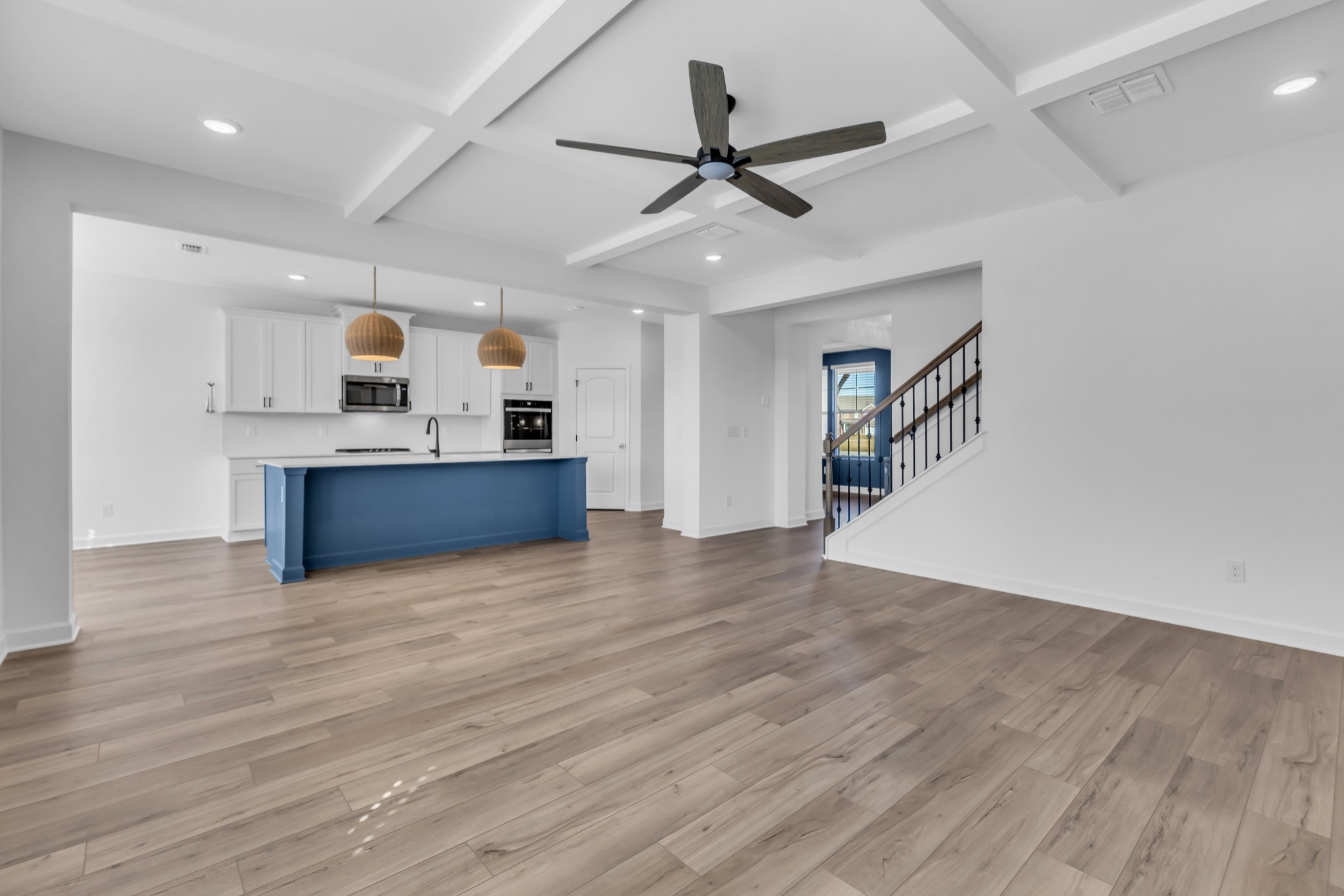 2701 Slatewood Way Murfreesboro, TN 37129 - Photo 17 of 30 a view of kitchen and empty room with wooden floor