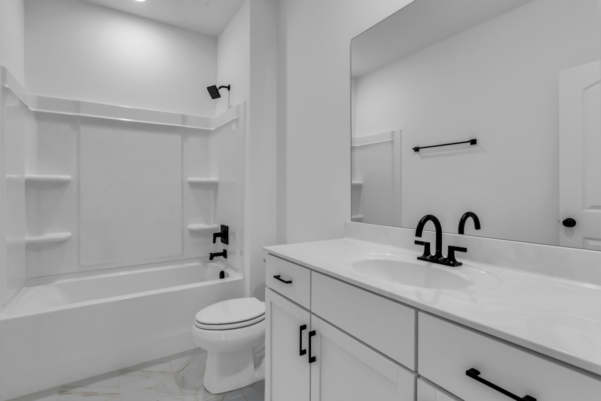 2701 Slatewood Way Murfreesboro, TN 37129 - Photo 19 of 30 a bathroom with a sink a toilet and a bathtub