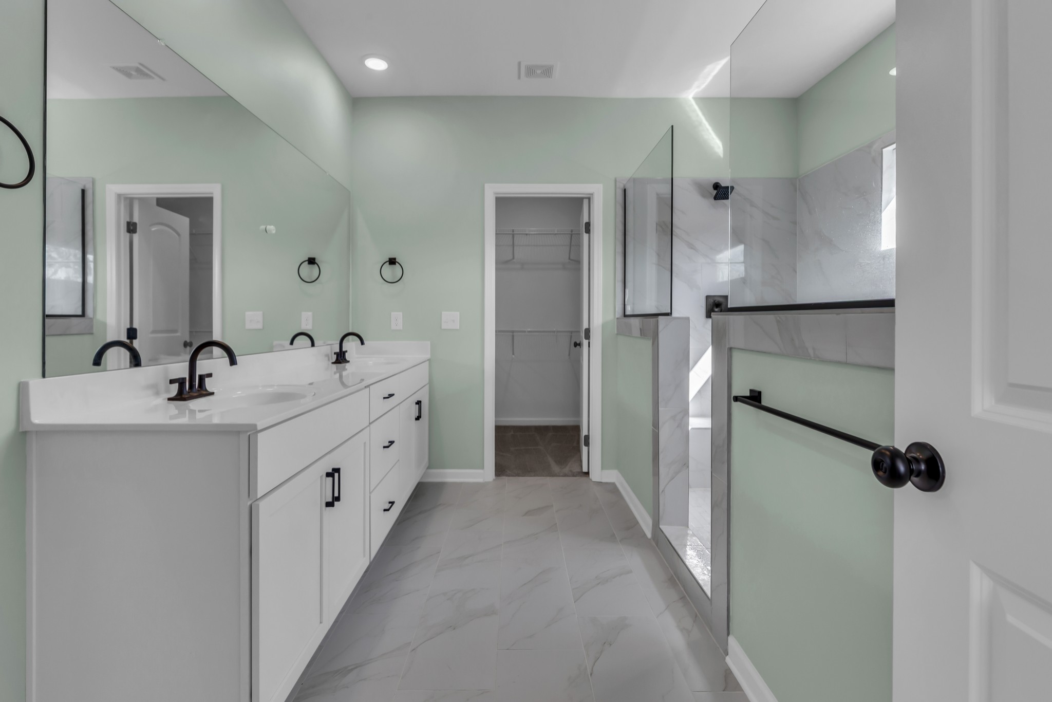 2701 Slatewood Way Murfreesboro, TN 37129 - Photo 23 of 30 a bathroom with a double vanity sink a mirror and a shower