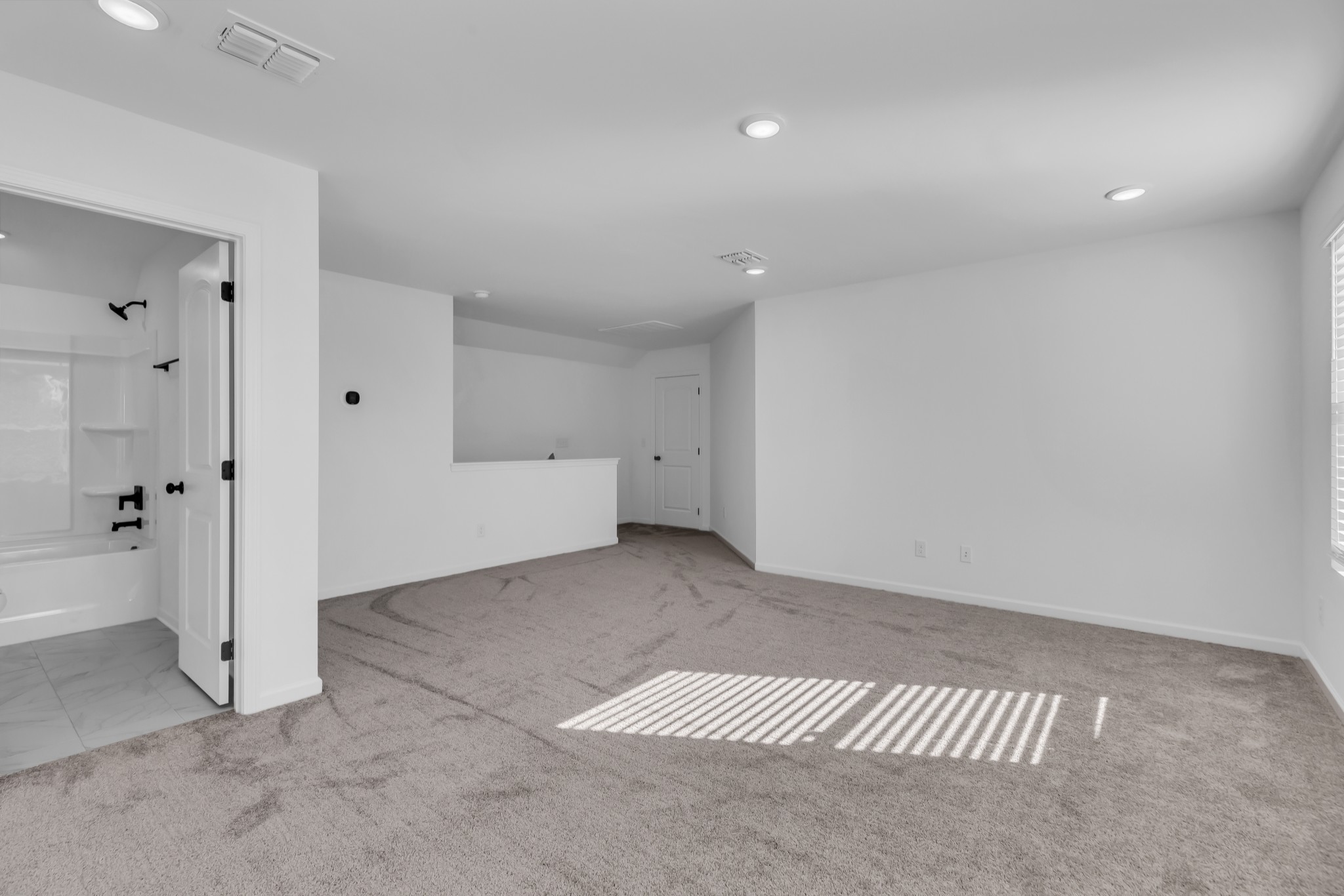 2701 Slatewood Way Murfreesboro, TN 37129 - Photo 27 of 30 an empty room with a bench and a refrigerator