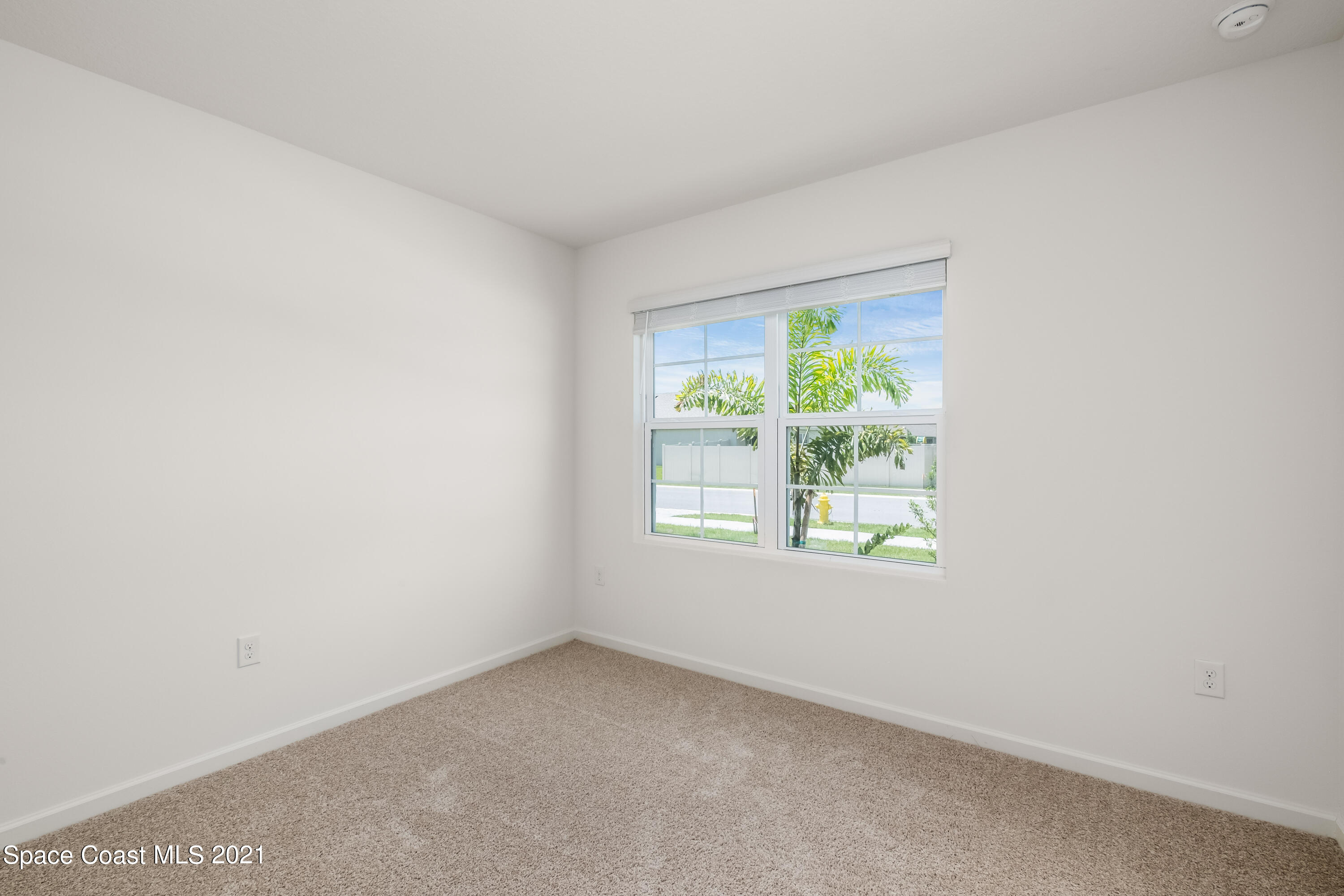 4631 Talbot Boulevard Cocoa, FL 32926 - Photo 13 of 23 an empty room with windows