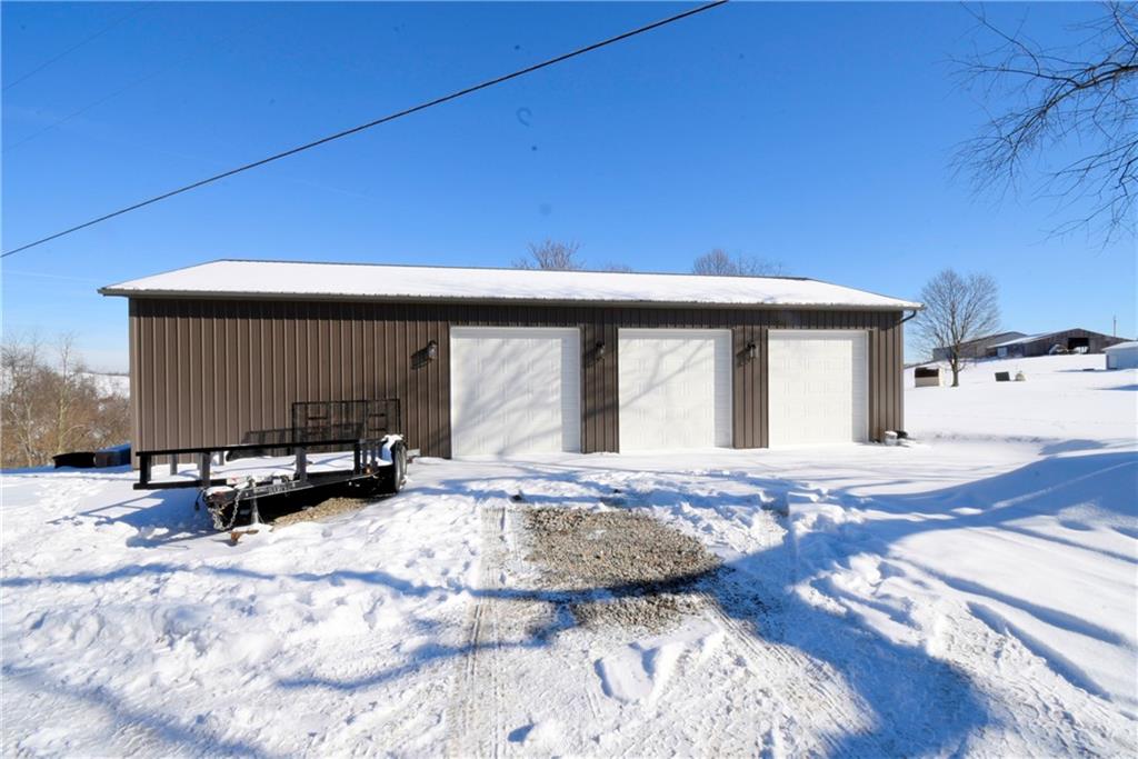 598 Dry Ridge Road West Alexander, PA 15376 - Photo 2 of 24 WOW!! 4/6 Car Garage with (3)10 foot Doors! 12' Ceilings 200 amp Service.. Water line in the building just needs hooked up.