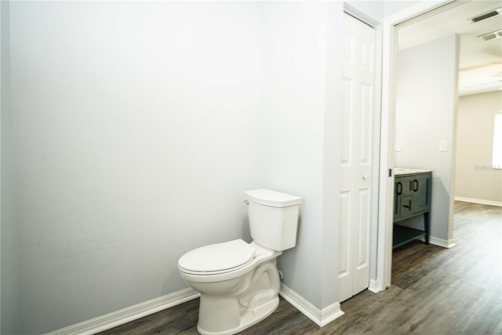 10523 Southwest 62nd Ter Road Ocala, FL 34476 - Photo 15 of 38 a bathroom with a toilet and a shower