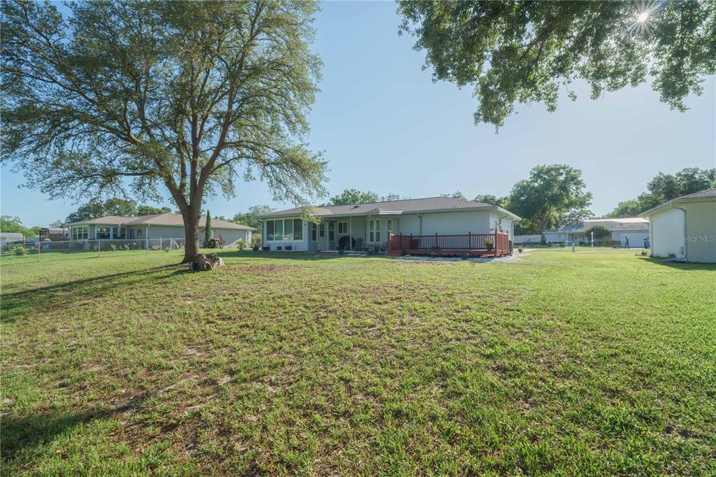 10523 Southwest 62nd Ter Road Ocala, FL 34476 - Photo 29 of 38 a front view of a house with garden