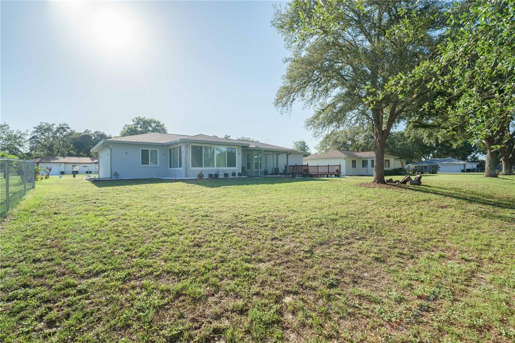 10523 Southwest 62nd Ter Road Ocala, FL 34476 - Photo 30 of 38 a view of a house with yard and sitting area