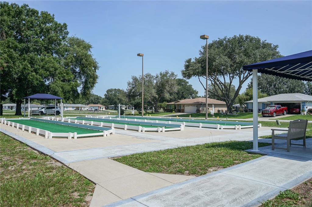 10523 Southwest 62nd Ter Road Ocala, FL 34476 - Photo 35 of 38 a childrens park with lots of swings and slides