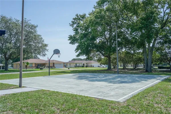 an aerial view of a house with outdoor space