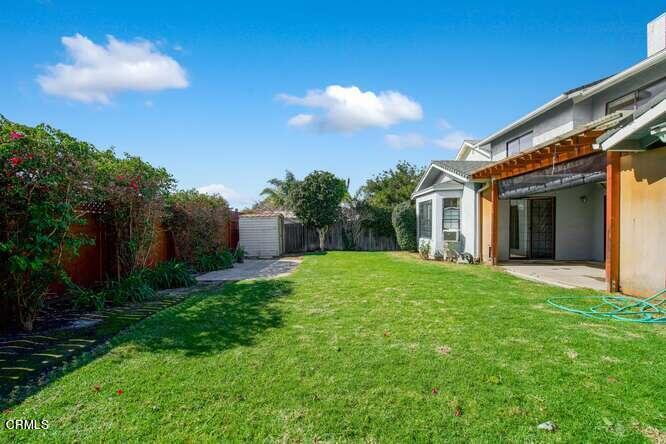 3020 Jacktar Avenue Oxnard, CA 93035 - Photo 27 of 31 a view of a house with backyard and garden