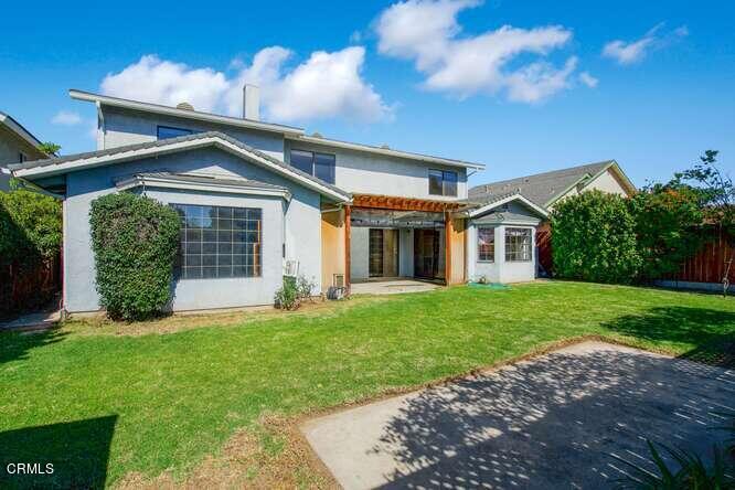 3020 Jacktar Avenue Oxnard, CA 93035 - Photo 29 of 31 a front view of a house with a yard