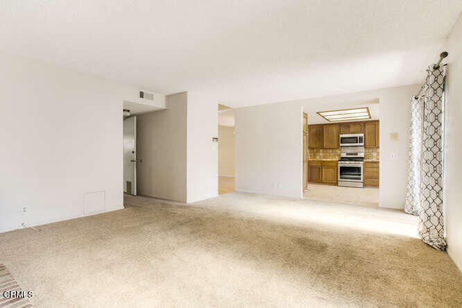 3020 Jacktar Avenue Oxnard, CA 93035 - Photo 7 of 31 an empty room with a natural light