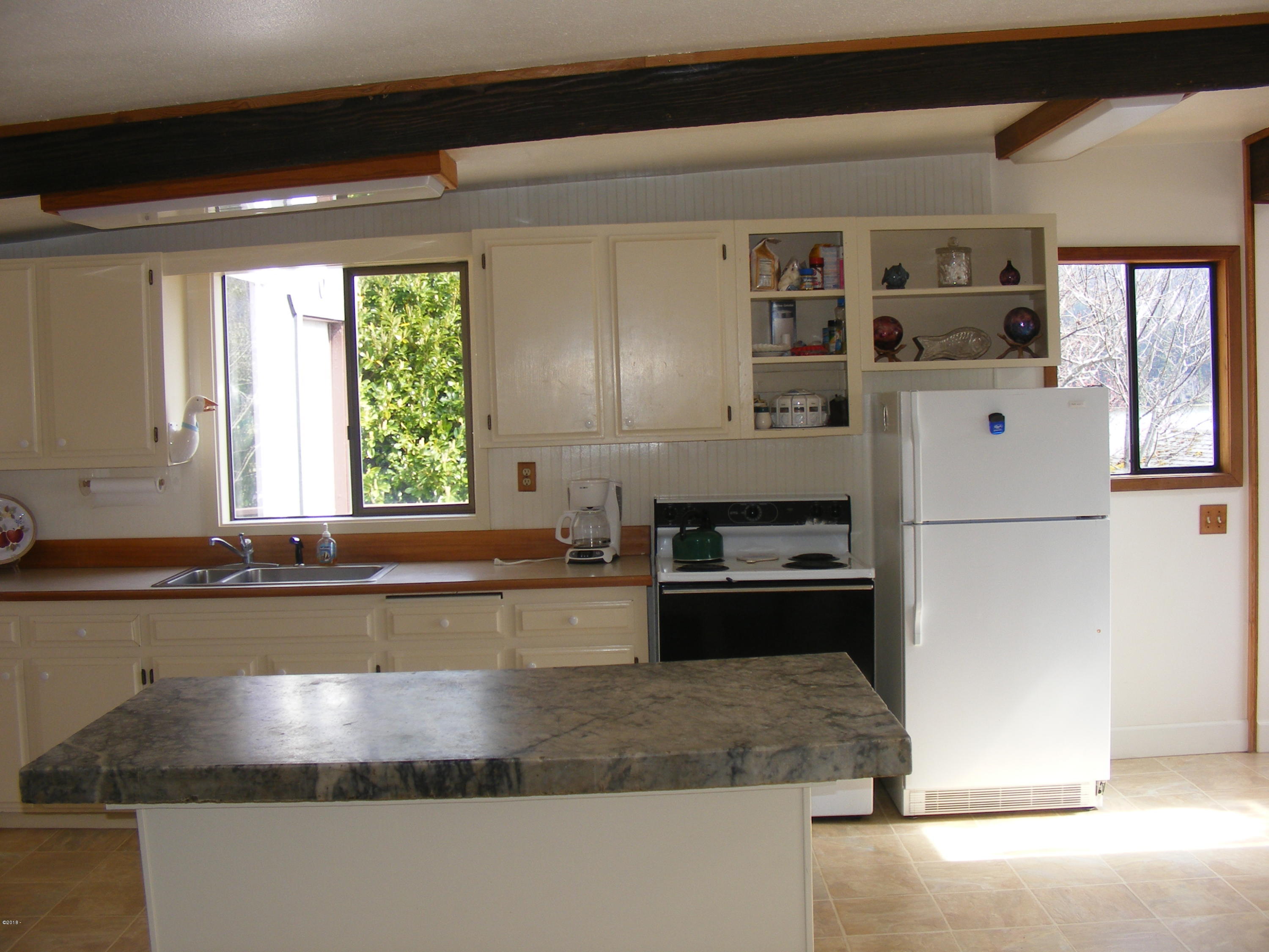 182 North Sheppard Point Road Waldport, OR 97394 - Photo 9 of 17 kitchen/island
