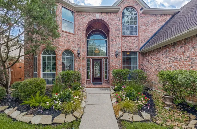 a house view with a outdoor space
