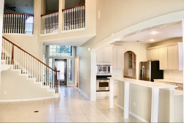 a view of an entryway with staircase