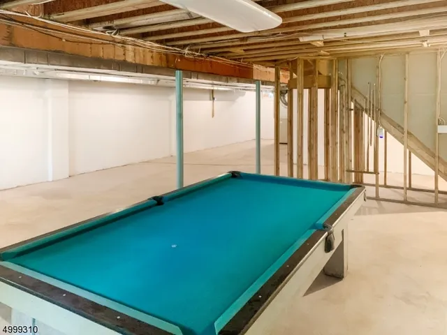 a view of a swimming pool with a yard