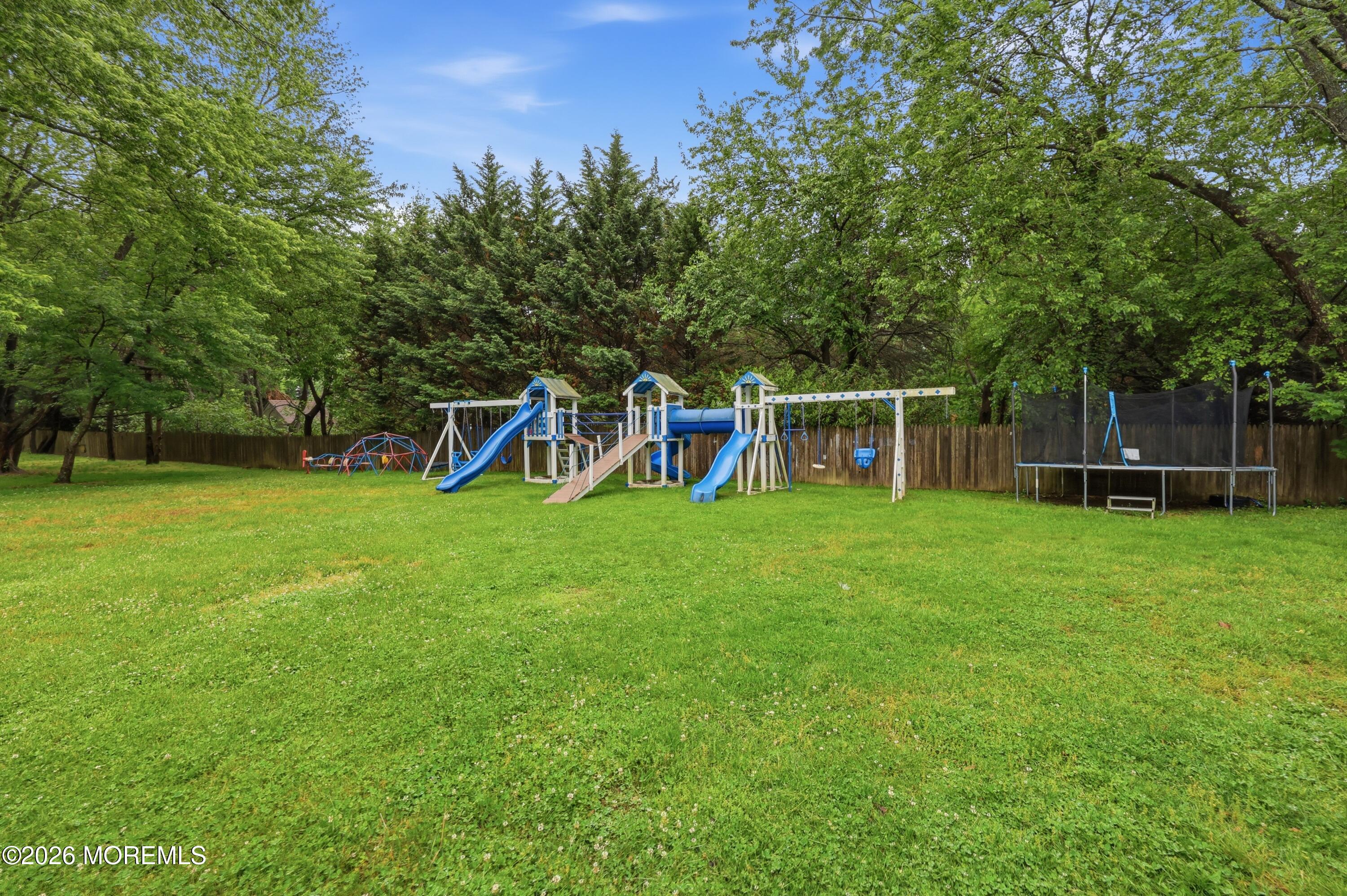 1845 Old Freehold Road Toms River, NJ 08755 - Photo 22 of 27 a view of a house with a backyard