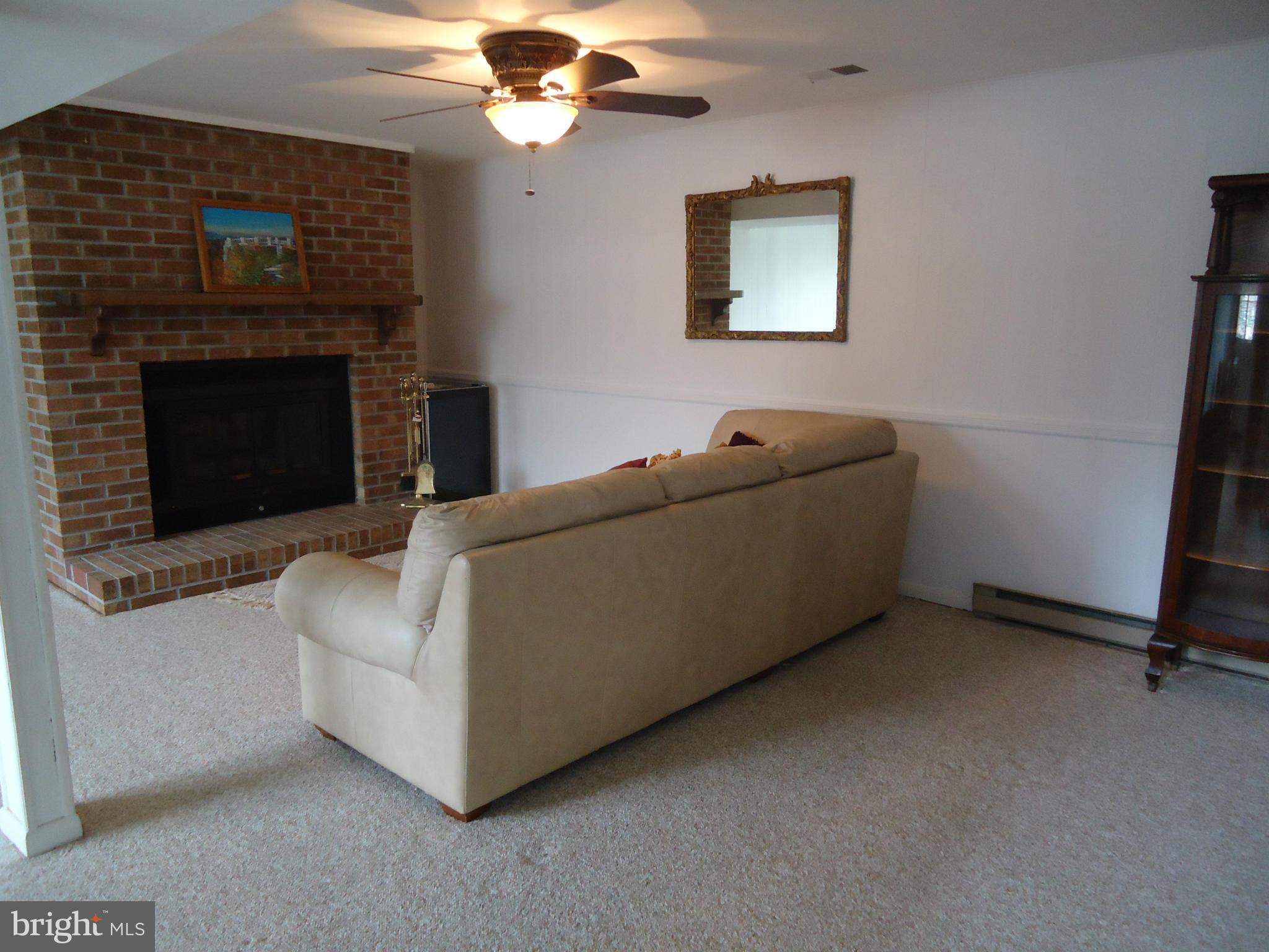 402 Rockway Road Baltimore, MD 21228 - Photo 15 of 26 Cozy Fireplace in Family Room