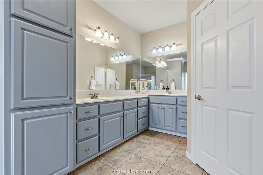2700 Hickory Court Bryan, TX 77808 - Photo 22 of 31 Dual sinks with great counterspace & toilet closet & 2 separate walk in closets