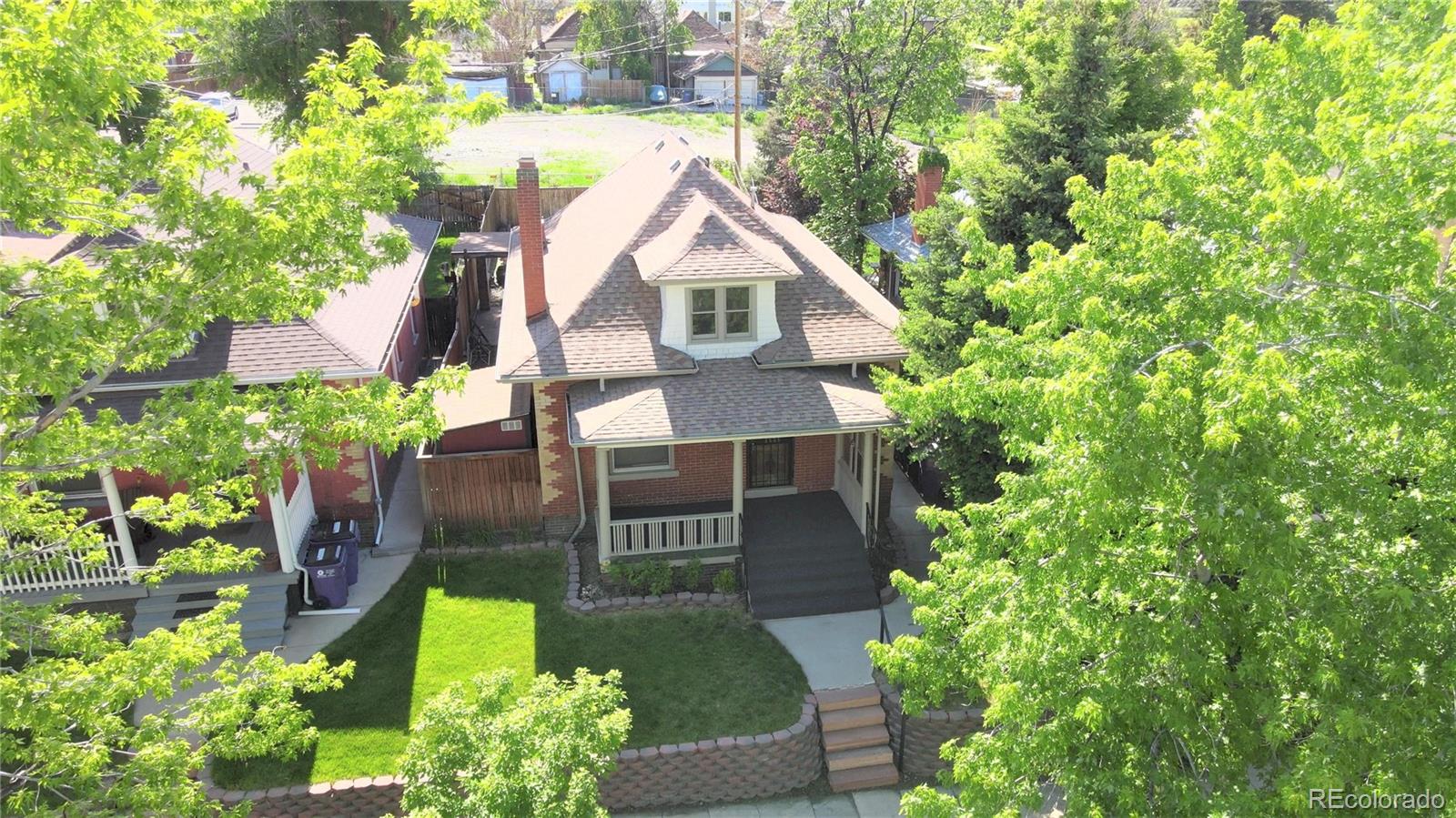 2835 Decatur Street Denver, CO 80211 - Photo 1 of 32 a house view with a outdoor space