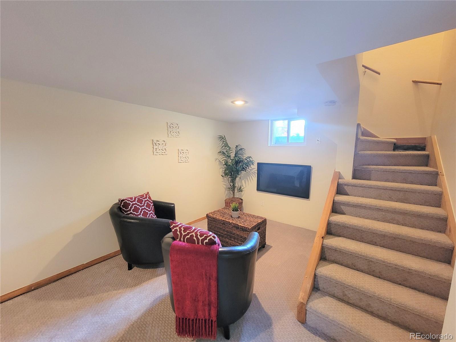 2835 Decatur Street Denver, CO 80211 - Photo 23 of 32 a living room with furniture