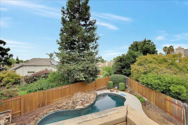 a view of an empty room and closet area