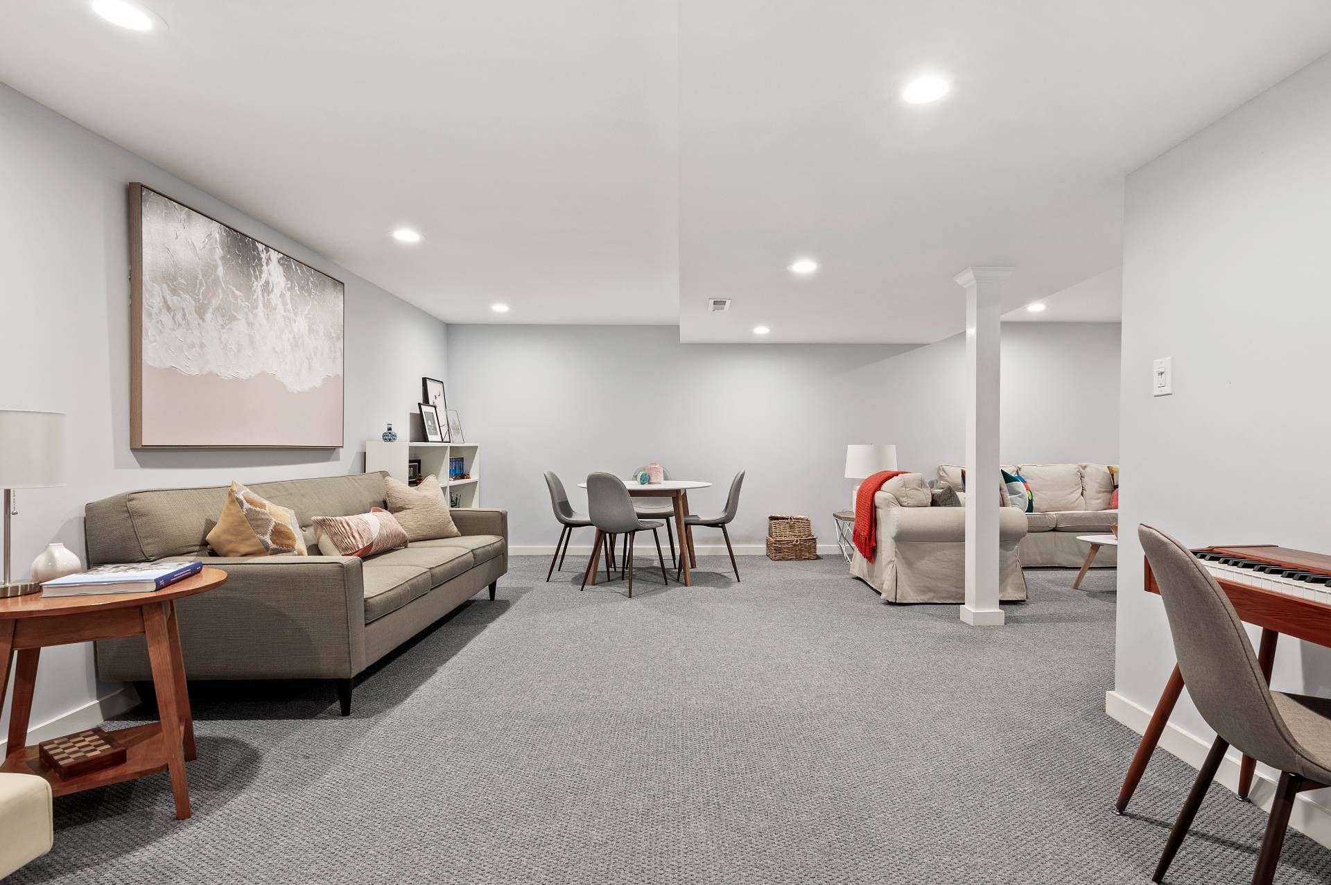 4594 Noyack Road Sag Harbor, NY 11963 - Photo 23 of 31 a living room with furniture and a table