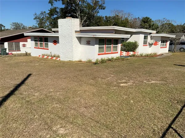 a view of house with outdoor space