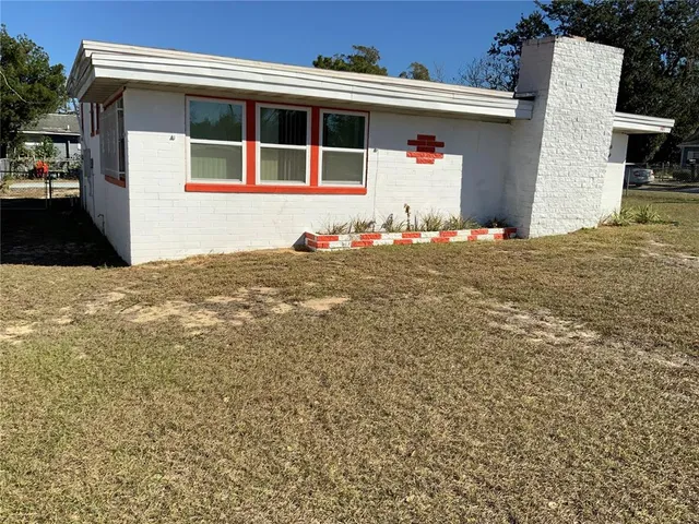 a house view with a backyard